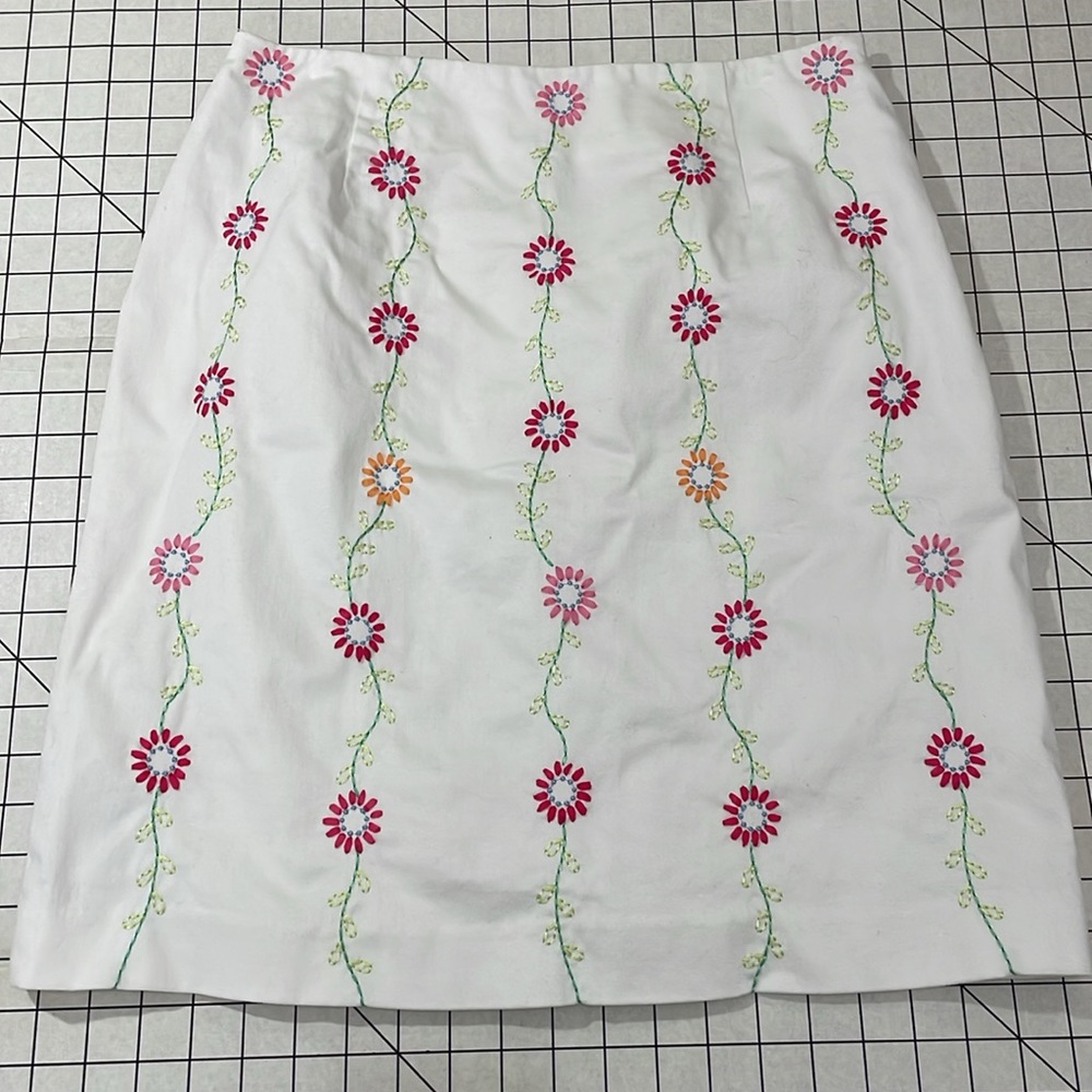 Larkspur white with pink embroidered flowers short skirt with lining